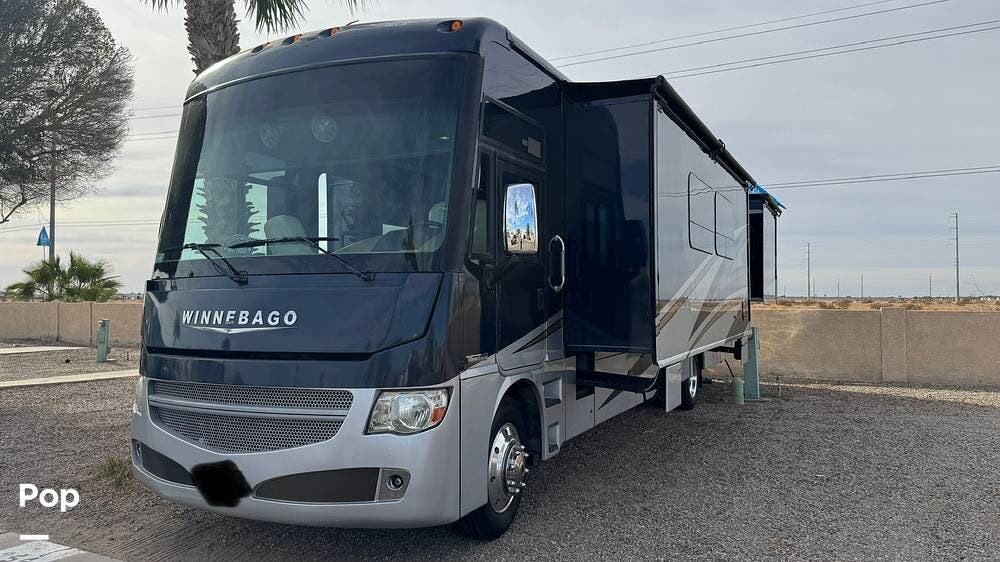 Call now about this 2015 Winnebago Adventurer 38Q! 2015 Winnebago Adventurer 38Q - Used Class A For Sale by Pop RVs in Yuma, Arizona features Awning, Air Conditioning, Generator, Leveling Jacks, Slideout