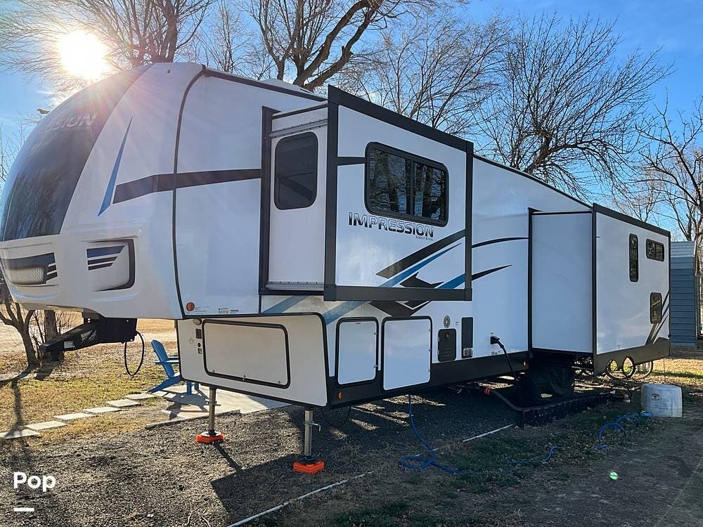 Call now about this 2024 Forest River Impression 318RLVIEW! 2024 Forest River Impression 318RLVIEW - Used Fifth Wheel For Sale by Pop RVs in Kinsley, Kansas features Slideout, Leveling Jacks, Awning, Air Conditioning
