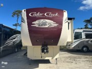Call now about this 2019 Forest River Cedar Creek 36CK2! 2019 Forest River Cedar Creek 36CK2 - Used Fifth Wheel For Sale by Pop RVs in Sebastian, Florida features Air Conditioning, Slideout, Awning, Leveling Jacks