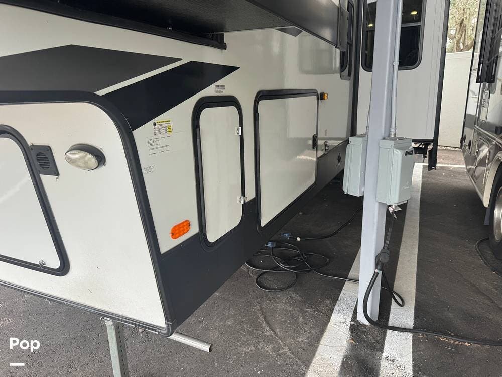 Call now about this 2023 Shasta Phoenix 367BH! 2023 Shasta Phoenix 367BH - Used Fifth Wheel For Sale by Pop RVs in Parrish, Florida features Slideout, Generator, Awning, Leveling Jacks, Air Conditioning