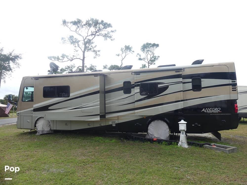 Call now about this 2012 Tiffin Allegro Red 38QRA! 2012 Tiffin Allegro Red 38QRA - Used Diesel Pusher For Sale by Pop RVs in Melbourne, Florida features Generator, Air Conditioning, Leveling Jacks, Awning, Slideout
