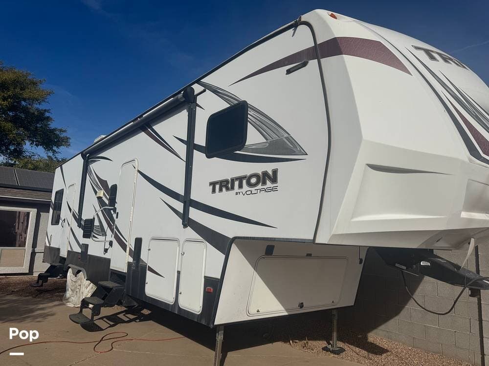Contact us now about this 2016 Dutchmen Voltage Triton 3451! 2016 Voltage Triton 3451 by Dutchmen from Pop RVs in Phoenix, Arizona