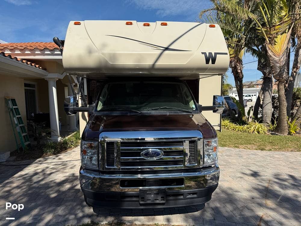 Call now about this 2022 Winnebago Minnie Winnie 26T! 2022 Winnebago Minnie Winnie 26T - Used Class C For Sale by Pop RVs in St Pete Beach, Florida features Awning, Air Conditioning, Leveling Jacks, Generator, Slideout