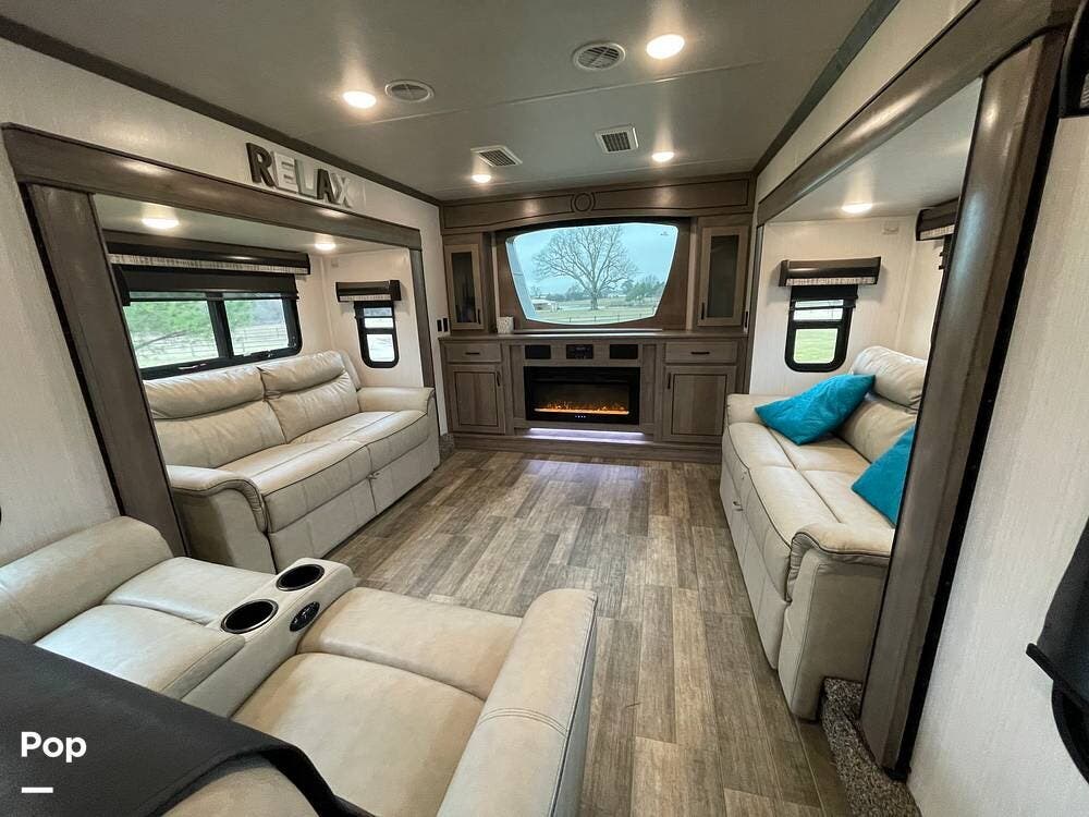 Call now about this 2021 Forest River Cedar Creek 385TH! 2021 Forest River Cedar Creek 385TH - Used Toy Hauler For Sale by Pop RVs in Paris, Texas features Slideout, Awning, Air Conditioning, Leveling Jacks