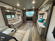 Call now about this 2021 Forest River Cedar Creek 385TH! 2021 Forest River Cedar Creek 385TH - Used Toy Hauler For Sale by Pop RVs in Paris, Texas features Slideout, Awning, Air Conditioning, Leveling Jacks