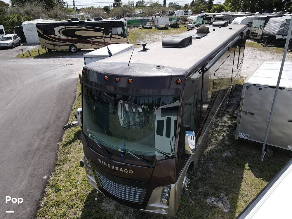 Call now about this 2017 Winnebago Adventurer 38Q! 2017 Winnebago Adventurer 38Q - Used Class A For Sale by Pop RVs in Deerfield Beach, Florida features Leveling Jacks, Air Conditioning, Awning, Slideout, Generator