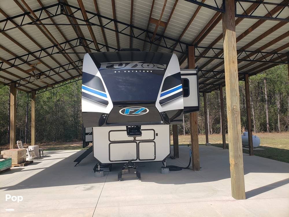 Contact us now about this 2022 Keystone Fuzion 373! 2022 Fuzion 373 by Keystone from Pop RVs in Pace, Florida