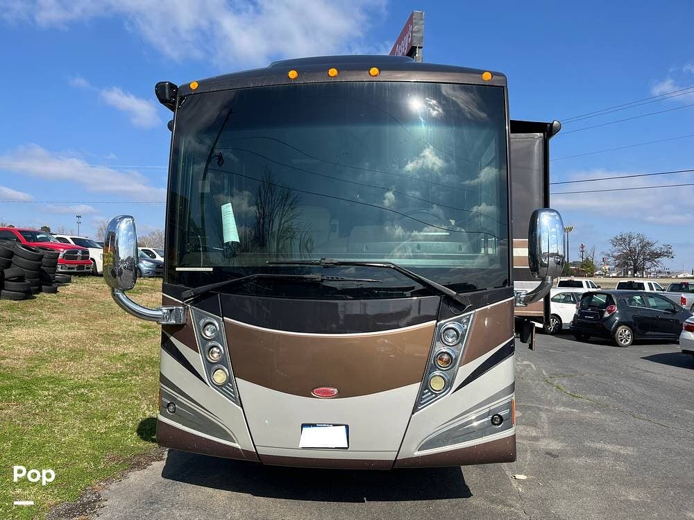 Call now about this 2012 Winnebago Tour 42QD! 2012 Winnebago Tour 42QD - Used Diesel Pusher For Sale by Pop RVs in Bryant, Arkansas features Leveling Jacks, Air Conditioning, Awning, Slideout, Generator