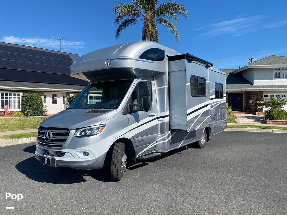 Call now about this 2021 Winnebago Navion 24V! 2021 Winnebago Navion 24V - Used Class C For Sale by Pop RVs in Orange, California features Air Conditioning, Slideout, Generator, Awning