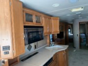 Call now about this 2007 Winnebago Tour 40TD! 2007 Winnebago Tour 40TD - Used Diesel Pusher For Sale by Pop RVs in Arvada, Colorado features Awning, Slideout, Generator, Leveling Jacks, Air Conditioning