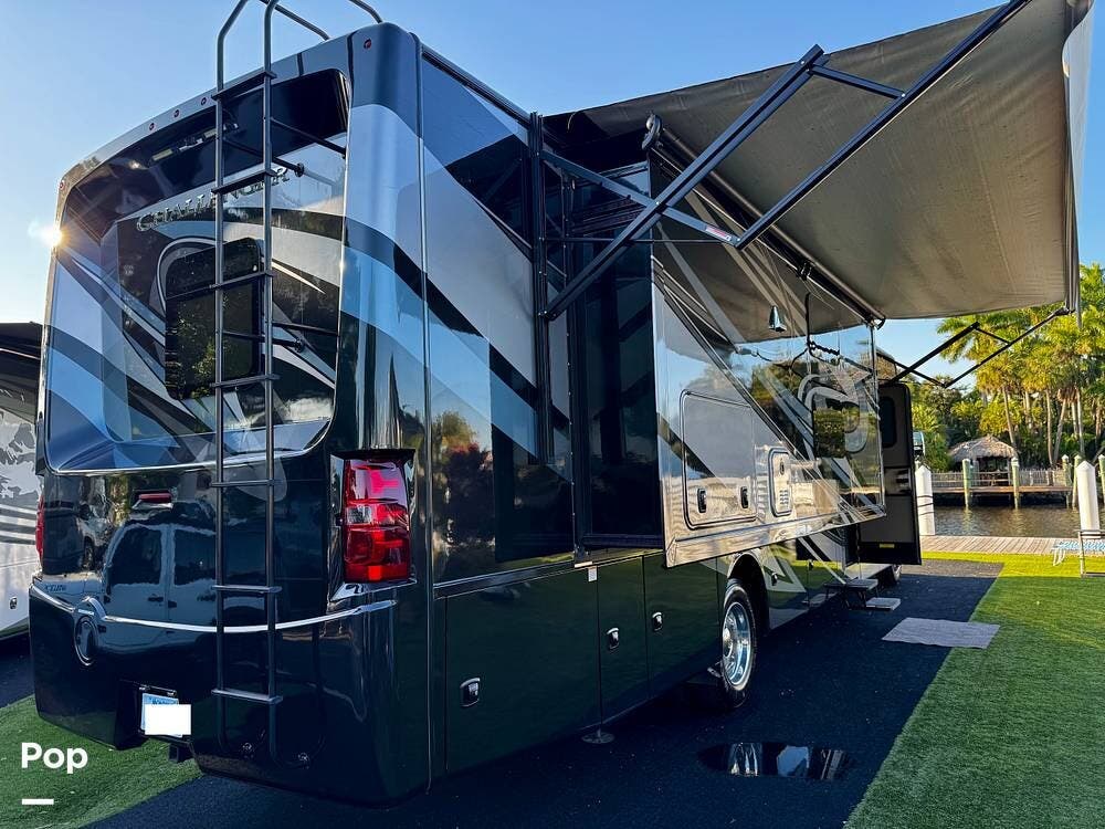 Call now about this 2021 Thor Motor Coach Challenger 37DS! 2021 Thor Motor Coach Challenger 37DS - Used Class A For Sale by Pop RVs in Homestead, Florida features Awning, Generator, Air Conditioning, Leveling Jacks, Slideout