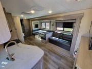 Call now about this 2022 Coachmen Catalina 293QBCK! 2022 Coachmen Catalina 293QBCK - Used Travel Trailer For Sale by Pop RVs in Fort Gibson, Oklahoma features Air Conditioning, Leveling Jacks, Slideout, Awning