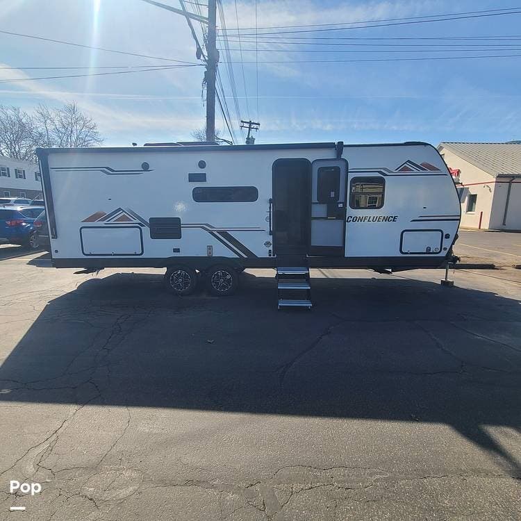 Call now about this 2022 K-Z Confluence 24BH! 2022 K-Z Confluence 24BH - Used Travel Trailer For Sale by Pop RVs in Orchard Park, New York features Slideout, Awning, Air Conditioning, Leveling Jacks
