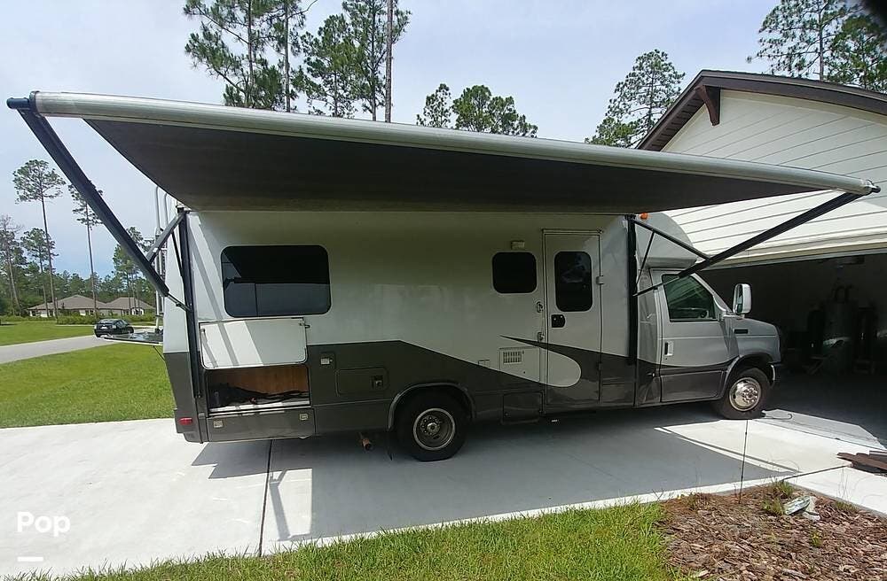 Call now about this 2015 Phoenix Cruiser 2351! 2015 Phoenix Cruiser 2351 - Used Class C For Sale by Pop RVs in Hilliard, Florida features Slideout, Air Conditioning, Leveling Jacks, Generator