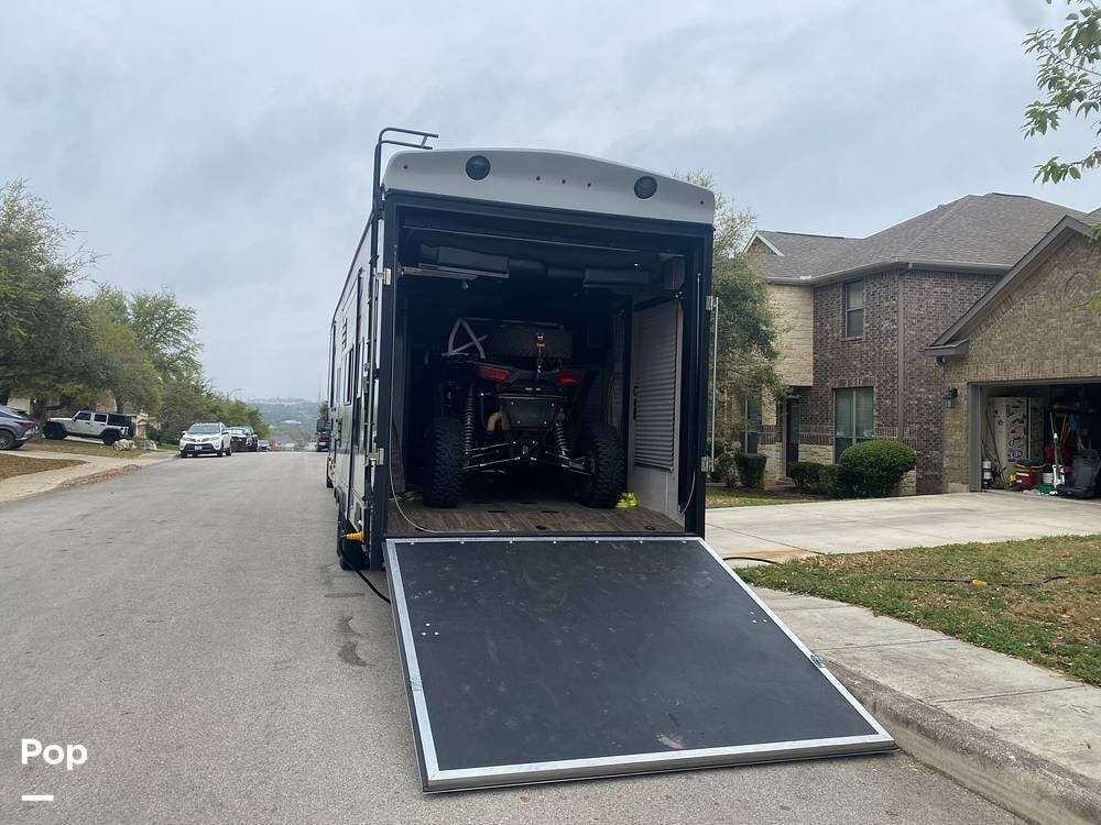 Call now about this 2022 Eclipse Attitude 3322SAG! 2022 Eclipse Attitude 3322SAG - Used Toy Hauler For Sale by Pop RVs in Canyon Lake, Texas features Awning, Generator, Slideout, Leveling Jacks, Air Conditioning