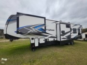 Call now about this 2021 Keystone Fuzion 373! 2021 Keystone Fuzion 373 - Used Toy Hauler For Sale by Pop RVs in Aiken, South Carolina features Generator, Air Conditioning, Slideout, Leveling Jacks, Awning