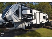 Call now about this 2021 Grand Design Momentum 395MS! 2021 Grand Design Momentum 395MS - Used Toy Hauler For Sale by Pop RVs in Mobile, Alabama features Slideout, Awning, Generator, Leveling Jacks, Air Conditioning