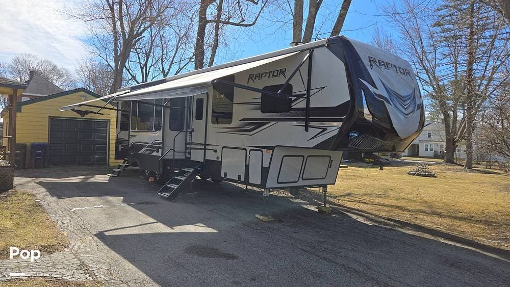 Call now about this 2019 Keystone Raptor 355TS! 2019 Keystone Raptor 355TS - Used Toy Hauler For Sale by Pop RVs in Westbrook, Maine features Leveling Jacks, Slideout, Awning, Air Conditioning, Generator