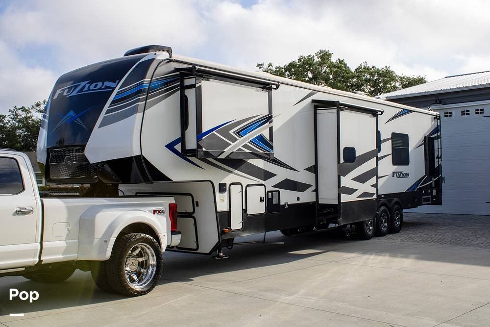 Contact us now about this 2021 Keystone Fuzion 419! 2021 Fuzion 419 by Keystone from Pop RVs in Lakeland, Florida