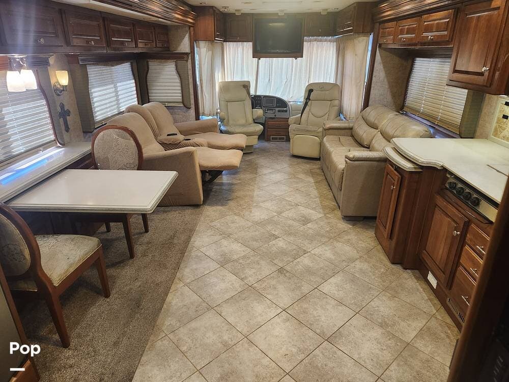 Call now about this 2007 Monaco RV Camelot 42PDQ! 2007 Monaco RV Camelot 42PDQ - Used Diesel Pusher For Sale by Pop RVs in Mercedes, Texas features Generator, Leveling Jacks, Slideout, Air Conditioning, Awning