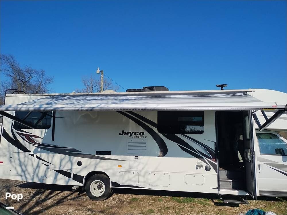 Call now about this 2021 Jayco Redhawk 31F! 2021 Jayco Redhawk 31F - Used Class C For Sale by Pop RVs in Niles, Michigan features Slideout, Awning, Generator, Air Conditioning