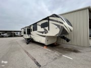 Call now about this 2021 Grand Design Solitude 390RK-R! 2021 Grand Design Solitude 390RK-R - Used Fifth Wheel For Sale by Pop RVs in Fort Worth, Texas features Slideout, Leveling Jacks, Awning, Air Conditioning