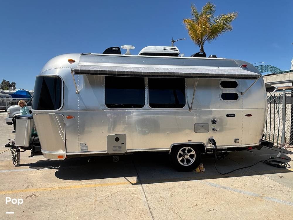 Call now about this 2022 Airstream Caravel 20FB! 2022 Airstream Caravel 20FB - Used Travel Trailer For Sale by Pop RVs in San Marcos, California features Leveling Jacks, Awning, Air Conditioning