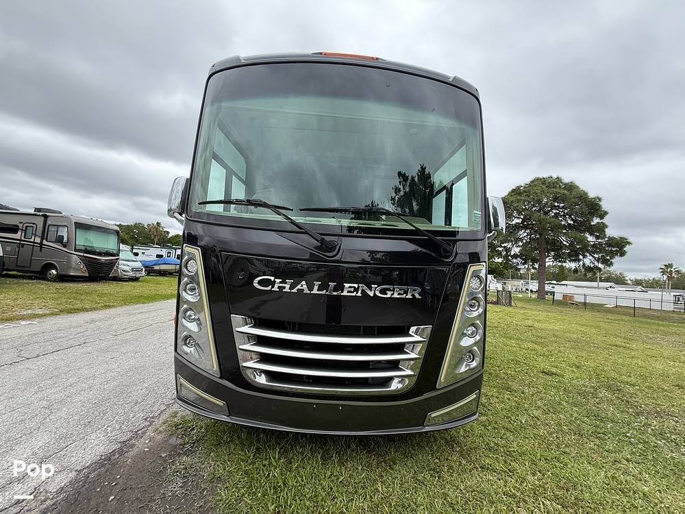 Call now about this 2022 Thor Motor Coach Challenger 35MQ! 2022 Thor Motor Coach Challenger 35MQ - Used Class A For Sale by Pop RVs in Clearwater, Florida features Generator, Awning, Slideout, Air Conditioning, Leveling Jacks