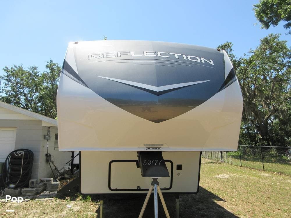 Contact us now about this 2024 Grand Design Reflection 303RLS! 2024 Reflection 303RLS by Grand Design from Pop RVs in Valrico, Florida