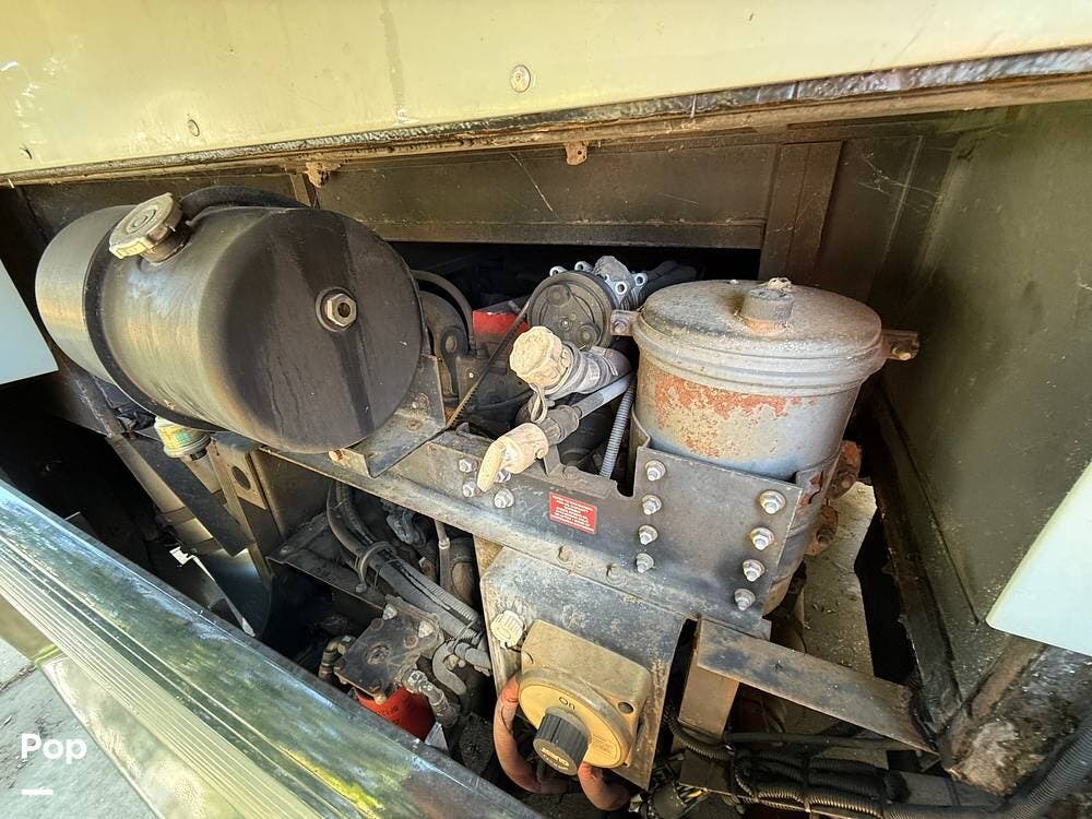 Call now about this 2003 Fleetwood Revolution 40C! 2003 Fleetwood Revolution 40C - Used Diesel Pusher For Sale by Pop RVs in Tampa, Florida features Generator, Leveling Jacks, Awning, Air Conditioning, Slideout