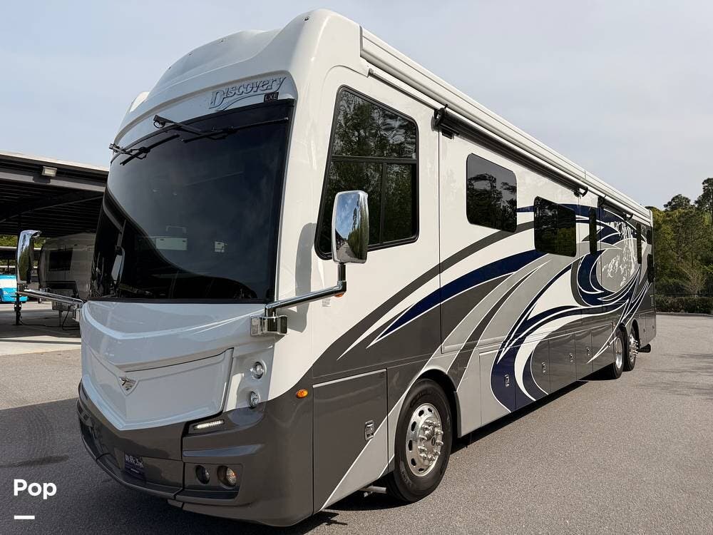 Contact us now about this 2022 Fleetwood Discovery LXE 44B! 2022 Discovery LXE 44B by Fleetwood from Pop RVs in Wildwood, Florida