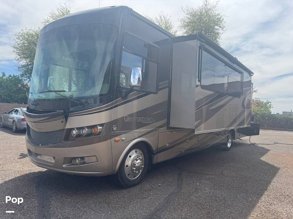 Call now about this 2014 Forest River Georgetown XL 360DS! 2014 Forest River Georgetown XL 360DS - Used Class A For Sale by Pop RVs in Glendale, Arizona features Leveling Jacks, Awning, Generator, Slideout, Air Conditioning
