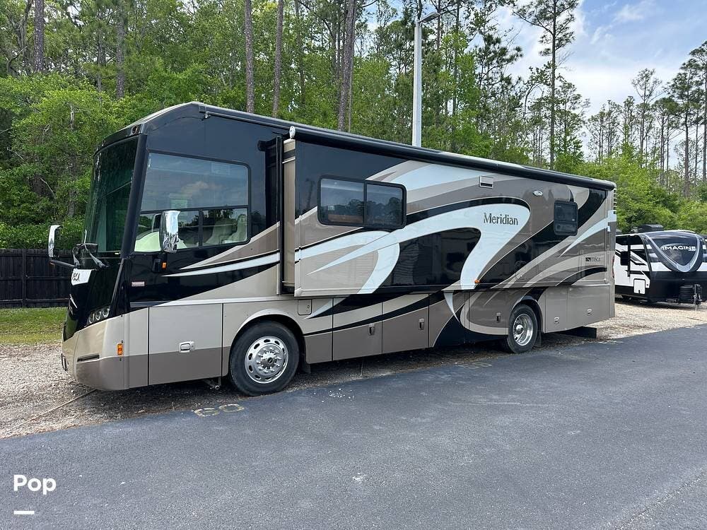 Call now about this 2013 Itasca Meridian 34B! 2013 Itasca Meridian 34B - Used Diesel Pusher For Sale by Pop RVs in Middleburg, Florida features Slideout, Air Conditioning, Awning, Leveling Jacks, Generator