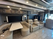 Call now about this 2022 Tiffin Phaeton 37BH! 2022 Tiffin Phaeton 37BH - Used Diesel Pusher For Sale by Pop RVs in Tampa, Florida features Generator, Air Conditioning, Awning, Slideout, Leveling Jacks