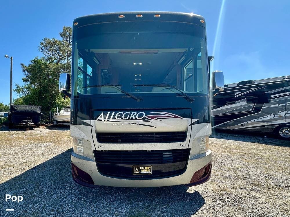 Call now about this 2013 Tiffin Allegro Open Road 32CA! 2013 Tiffin Allegro Open Road 32CA - Used Class A For Sale by Pop RVs in Carolina Beach, North Carolina features Leveling Jacks, Awning, Air Conditioning, Generator, Slideout