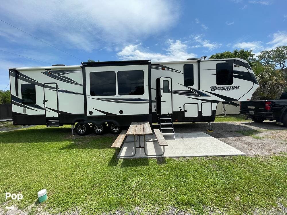 Contact us now about this 2018 Grand Design Momentum 388M! 2018 Momentum 388M by Grand Design from Pop RVs in Sebastian, Florida
