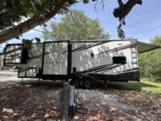 Call now about this 2022 Forest River XLR Nitro 321! 2022 Forest River XLR Nitro 321 - Used Toy Hauler For Sale by Pop RVs in Plantation, Florida features Generator, Leveling Jacks, Awning, Slideout, Air Conditioning
