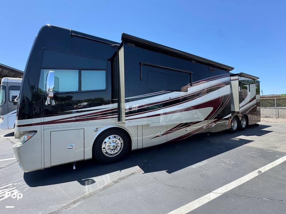 Call now about this 2014 Tiffin Phaeton 42LH! 2014 Tiffin Phaeton 42LH - Used Diesel Pusher For Sale by Pop RVs in Temucula, California features Air Conditioning, Leveling Jacks, Slideout, Generator, Awning