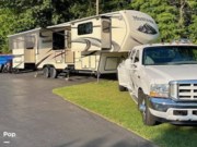 Call now about this 2015 Keystone Montana 3850FL! 2015 Keystone Montana 3850FL - Used Fifth Wheel For Sale by Pop RVs in Geneva, New York features Slideout, Leveling Jacks, Air Conditioning, Awning