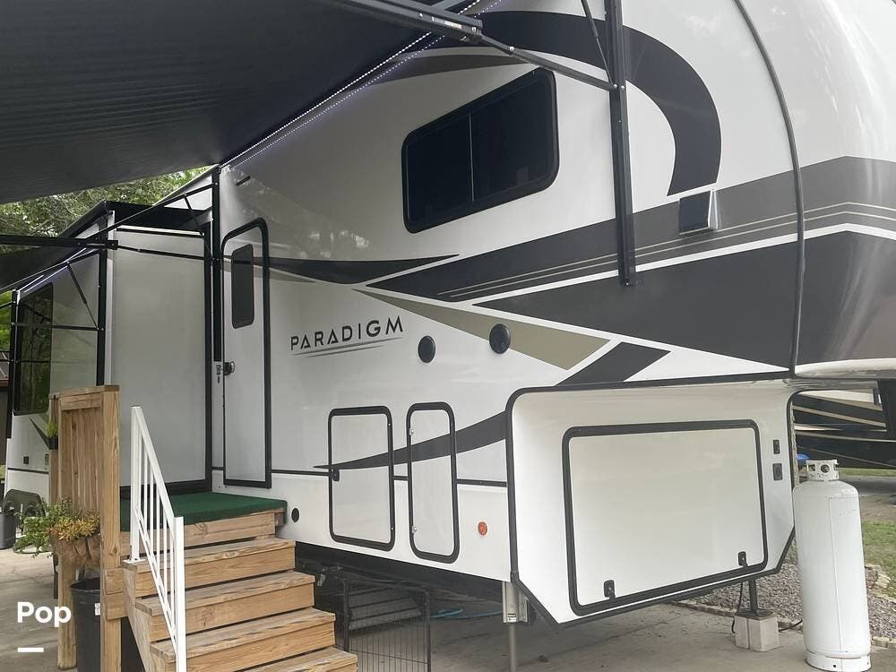 Call now about this 2024 Alliance RV Paradigm 395DS! 2024 Alliance RV Paradigm 395DS - Used Fifth Wheel For Sale by Pop RVs in Wesley Chapel, Florida features Awning, Slideout, Air Conditioning, Leveling Jacks