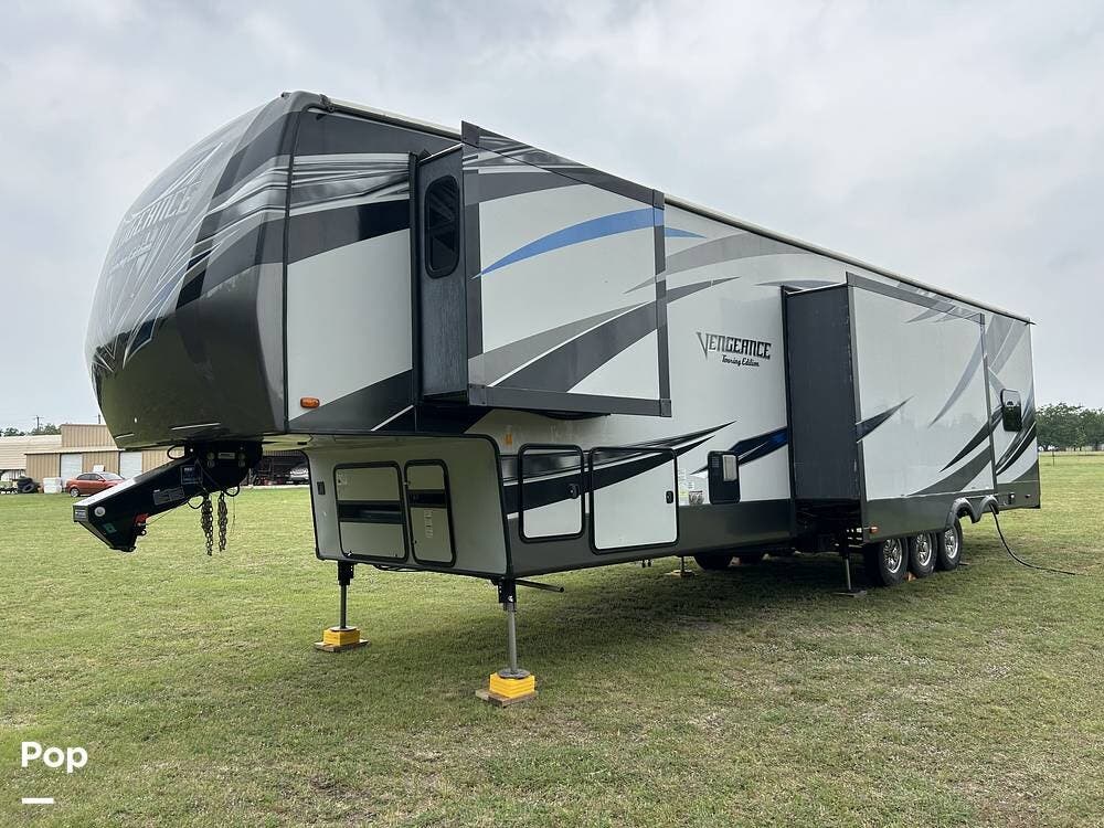 Call now about this 2016 Forest River Vengeance Touring 39R13! 2016 Forest River Vengeance Touring 39R13 - Used Toy Hauler For Sale by Pop RVs in Azle, Texas features Slideout, Leveling Jacks, Generator, Air Conditioning, Awning