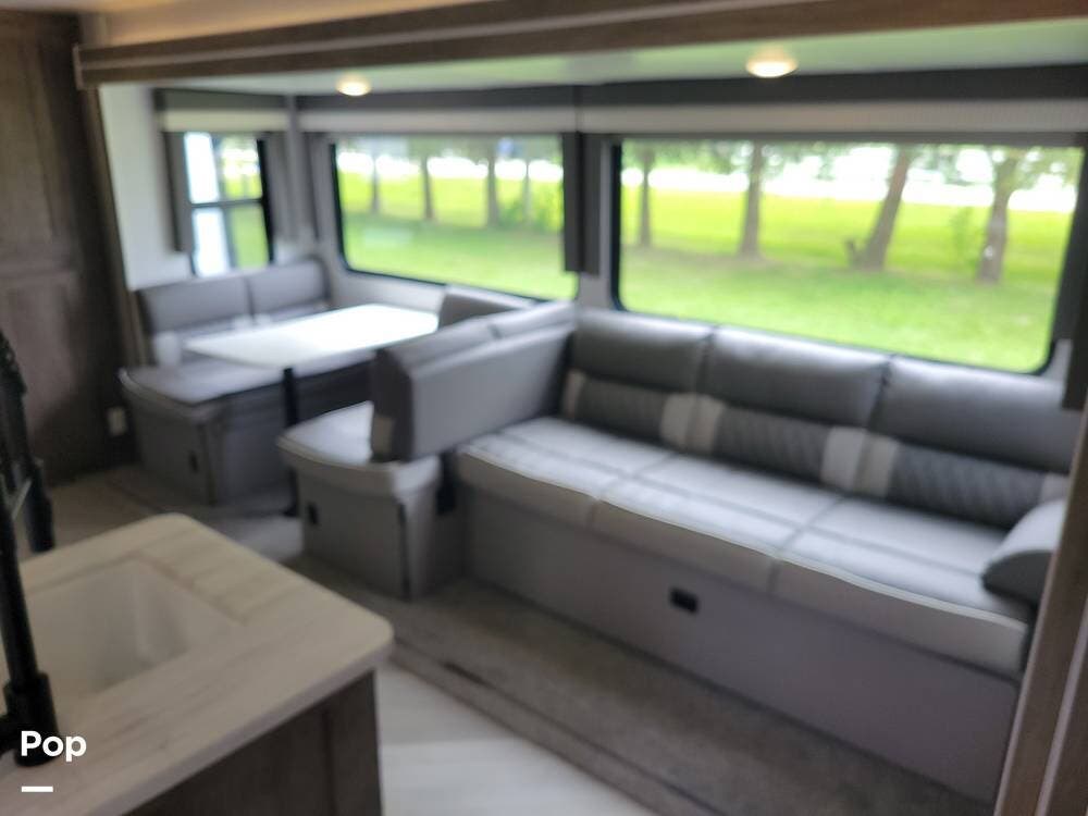 Call now about this 2022 Forest River Wildwood 33TS! 2022 Forest River Wildwood 33TS - Used Travel Trailer For Sale by Pop RVs in Ottawa, Illinois features Awning, Slideout, Air Conditioning