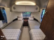 Call now about this 2020 Airstream Globetrotter 23FB TWIN! 2020 Airstream Globetrotter 23FB TWIN - Used Travel Trailer For Sale by Pop RVs in Casselberry, Florida features Air Conditioning, Awning, Leveling Jacks