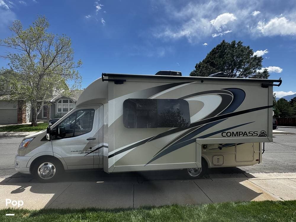 Call now about this 2021 Thor Motor Coach Compass 23TW AWD! 2021 Thor Motor Coach Compass 23TW AWD - Used Class C For Sale by Pop RVs in Colorado Springs, Colorado features Awning, Slideout, Leveling Jacks, Air Conditioning, Generator