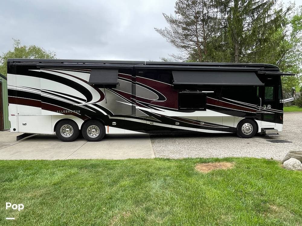 Call now about this 2019 Tiffin Allegro Bus 45 OPP! 2019 Tiffin Allegro Bus 45 OPP - Used Diesel Pusher For Sale by Pop RVs in Oakland, Michigan features Leveling Jacks, Awning, Air Conditioning, Generator, Slideout