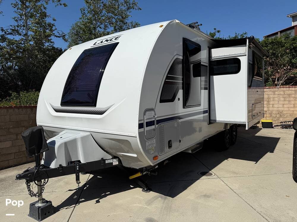 Call now about this 2023 Lance Lance 2185! 2023 Lance Lance 2185 - Used Travel Trailer For Sale by Pop RVs in Poway, California features Slideout, Awning, Air Conditioning, Leveling Jacks