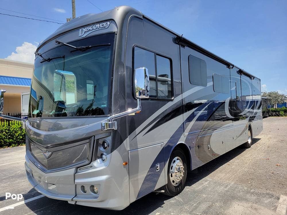 Call now about this 2022 Fleetwood Discovery 38W! 2022 Fleetwood Discovery 38W - Used Diesel Pusher For Sale by Pop RVs in Pompano Beach, Florida features Awning, Slideout, Leveling Jacks, Air Conditioning, Generator