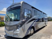 Call now about this 2022 Fleetwood Discovery 38W! 2022 Fleetwood Discovery 38W - Used Diesel Pusher For Sale by Pop RVs in Pompano Beach, Florida features Awning, Slideout, Leveling Jacks, Air Conditioning, Generator