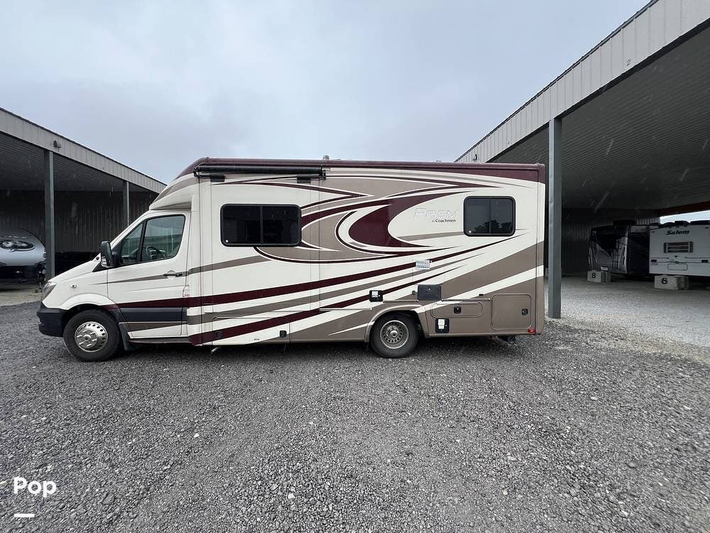 Call now about this 2015 Coachmen Prism 24G! 2015 Coachmen Prism 24G - Used Class C For Sale by Pop RVs in Indianapolis, Indiana features Air Conditioning, Generator, Slideout, Awning
