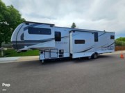 Call now about this 2023 Alliance RV Paradigm 385FL! 2023 Alliance RV Paradigm 385FL - Used Fifth Wheel For Sale by Pop RVs in Castle Rock, Colorado features Leveling Jacks, Air Conditioning, Awning, Slideout